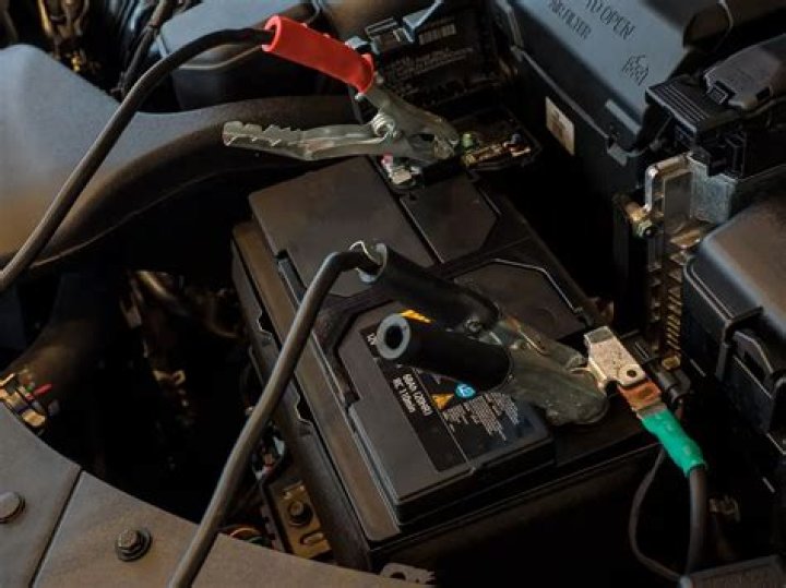 How long does it take to charge a dead car battery with jumper cables?